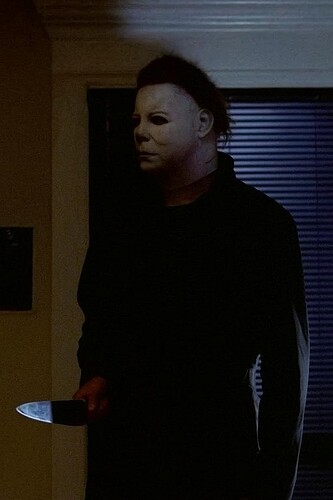 20251016_2144_Masked Figure Holding Knife_remix_01k7qxatgrfh1by3b3r251m8fe